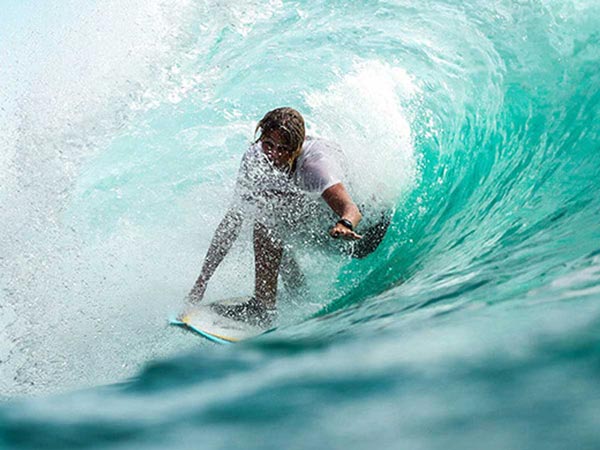 Surfer Surfing.