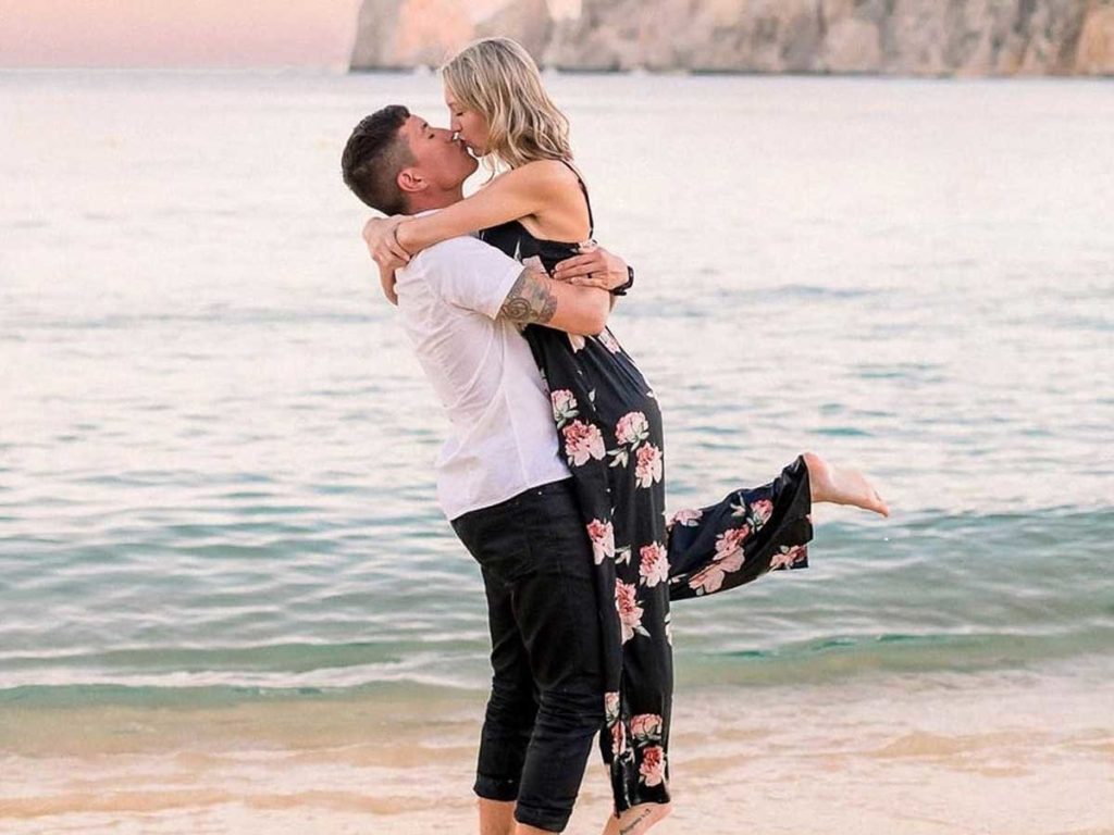 Couple On The Beach In Cabo.