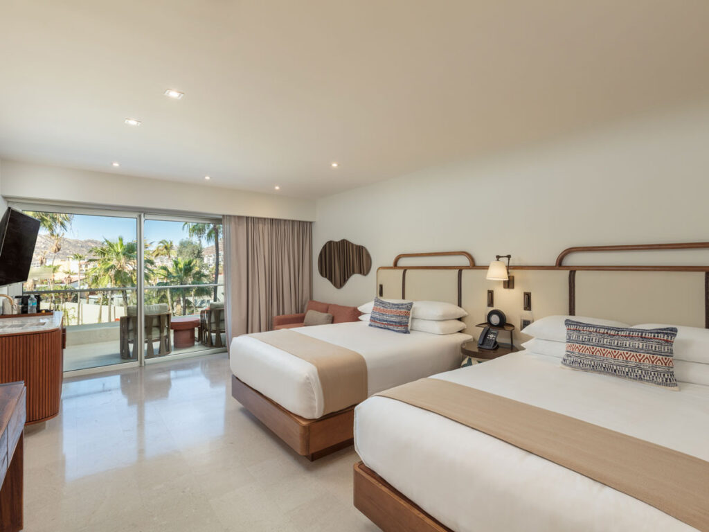 Guestroom With Two Beds In Cabo