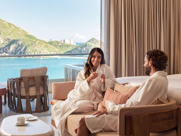 Couple In A Cabo Guestroom